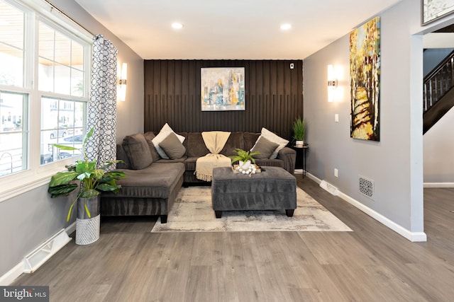 412 Horace Ave, Palmyra, NJ 08065 - living area featuring an accent wall, baseboards, wood finished floors, recessed lighting, and stairs