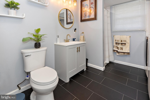 412 Horace Ave, Palmyra, NJ 08065 - full bathroom with vanity, toilet, baseboards, tile patterned flooring, and a shower with curtain