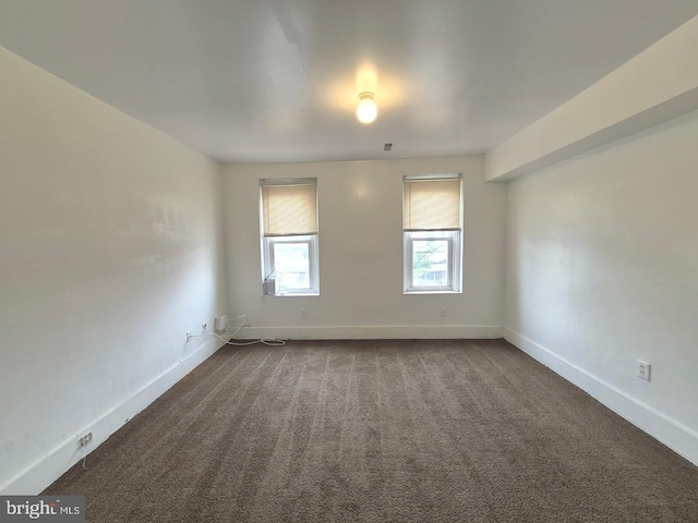 507 Newton Ave, Camden, NJ 08103 - unfurnished room featuring dark carpet and baseboards
