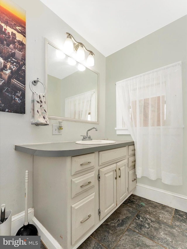 19330 Longmeadow Rd, Hagerstown, MD 21742 - bathroom with vanity and baseboards