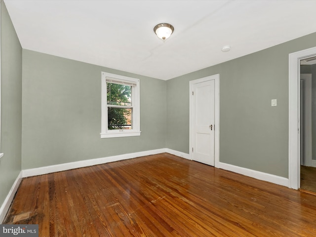 19330 Longmeadow Rd, Hagerstown, MD 21742 - unfurnished room with baseboards, wood finished floors, and a smoke detector