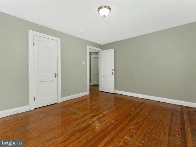 19330 Longmeadow Rd, Hagerstown, MD 21742 - unfurnished bedroom featuring baseboards and wood finished floors