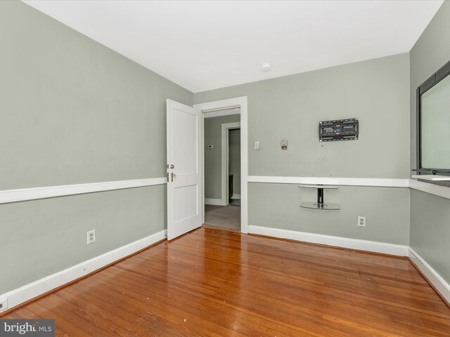 19330 Longmeadow Rd, Hagerstown, MD 21742 - unfurnished room with wood finished floors, baseboards, and a smoke detector