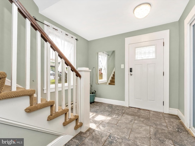19330 Longmeadow Rd, Hagerstown, MD 21742 - foyer entrance featuring stairway, baseboards, and stone finish flooring