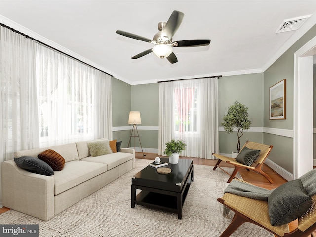 19330 Longmeadow Rd, Hagerstown, MD 21742 - living area with ceiling fan, crown molding, baseboards, and wood finished floors