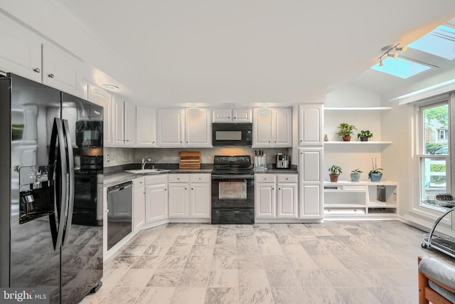 1 Second Tee Ct, Baltimore, MD 21209 - kitchen featuring black appliances, white cabinets, dark countertops, and tasteful backsplash