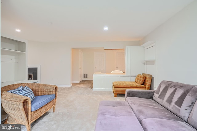 1 Second Tee Ct, Baltimore, MD 21209 - living area with light carpet, recessed lighting, and a fireplace