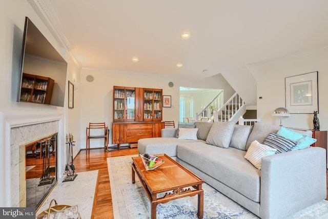 1 Second Tee Ct, Baltimore, MD 21209 - living room featuring stairway, light wood-type flooring, ornamental molding, a high end fireplace, and recessed lighting