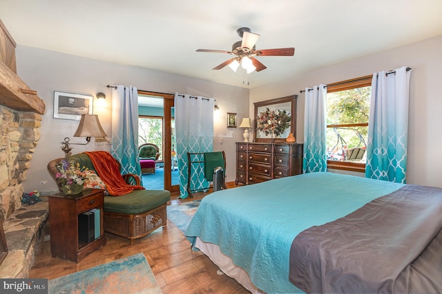400 Berry Mountain Rd, Millersburg, PA 17061 - bedroom featuring multiple windows, ceiling fan, and wood finished floors