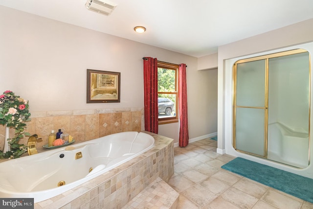 400 Berry Mountain Rd, Millersburg, PA 17061 - bathroom with a jetted tub, a shower stall, and baseboards