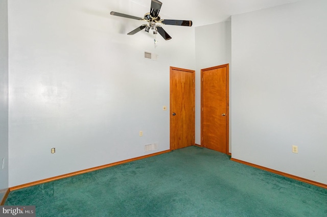 400 Berry Mountain Rd, Millersburg, PA 17061 - empty room featuring carpet flooring, a ceiling fan, baseboards, and a towering ceiling