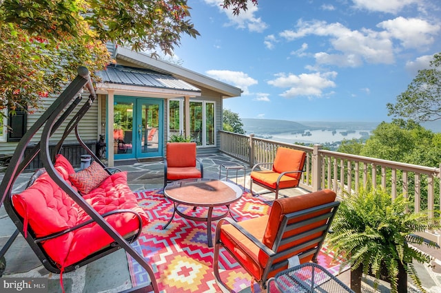 400 Berry Mountain Rd, Millersburg, PA 17061 - wooden deck with french doors, an outdoor hangout area, and a water view
