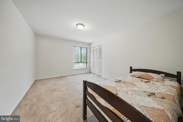 4408 Island Pl Unit T2, Annandale, VA 22003 - bedroom with light colored carpet, baseboards, and a closet