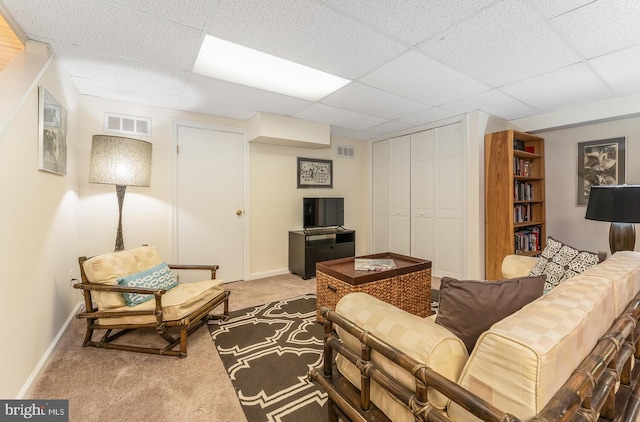 303 Knoll Way, Rocky Hill, NJ 08553 - carpeted living area featuring a drop ceiling and baseboards