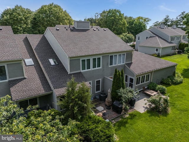 303 Knoll Way, Rocky Hill, NJ 08553 - back of house with roof with shingles, a patio area, a yard, and a residential view