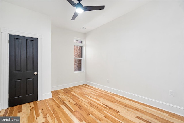 1630 E Biddle St, Baltimore, MD 21213 - unfurnished room with a ceiling fan, baseboards, and wood finished floors