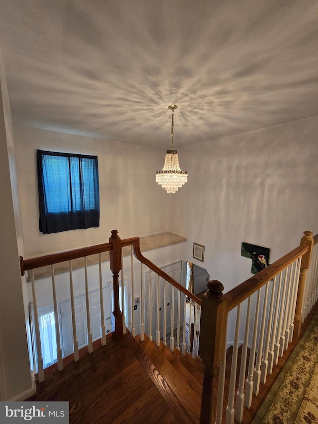 5546 Neddleton Ave, Woodbridge, VA 22193 - stairway featuring a chandelier and wood finished floors