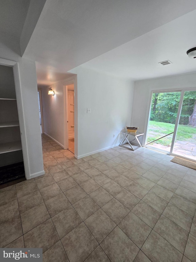 5546 Neddleton Ave, Woodbridge, VA 22193 - unfurnished room with tile patterned flooring and baseboards