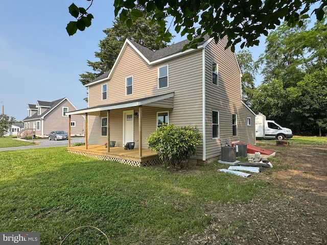 26959 Branchtown Rd, Worton, MD 21678 - view of front of home with a front yard, a porch, and central AC unit
