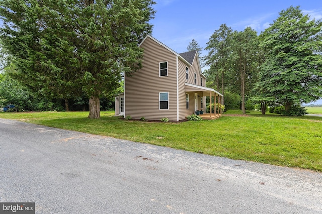 26959 Branchtown Rd, Worton, MD 21678 - view of side of home featuring a yard
