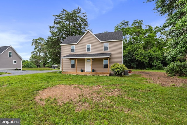 26959 Branchtown Rd, Worton, MD 21678 - view of front of home featuring covered porch, a front lawn, and a shingled roof