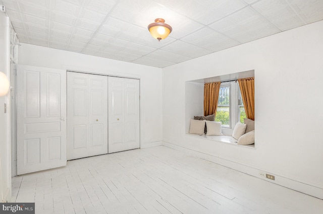 335 W Walnut St, Lancaster, PA 17603 - unfurnished bedroom with a closet and wood finished floors