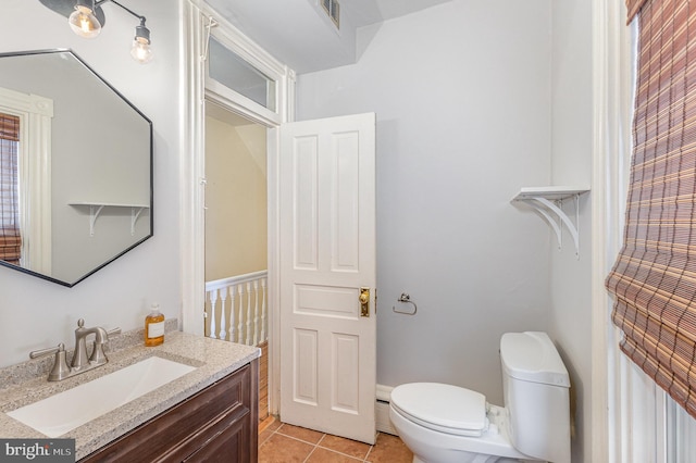 335 W Walnut St, Lancaster, PA 17603 - bathroom featuring toilet, vanity, and tile patterned floors