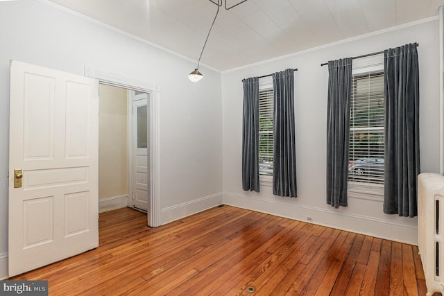 335 W Walnut St, Lancaster, PA 17603 - unfurnished room with ornamental molding, light wood-style floors, baseboards, and radiator heating unit