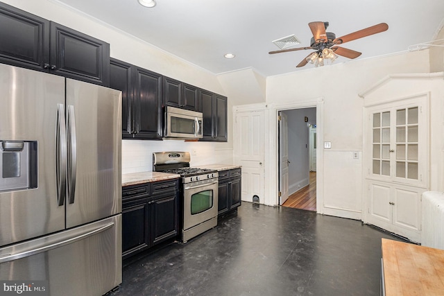335 W Walnut St, Lancaster, PA 17603 - kitchen featuring stainless steel appliances, dark cabinetry, a ceiling fan, tasteful backsplash, and recessed lighting