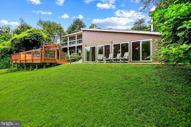 4441 Solomons Island Rd, Harwood, MD 20776 - rear view of property with a yard and a wooden deck