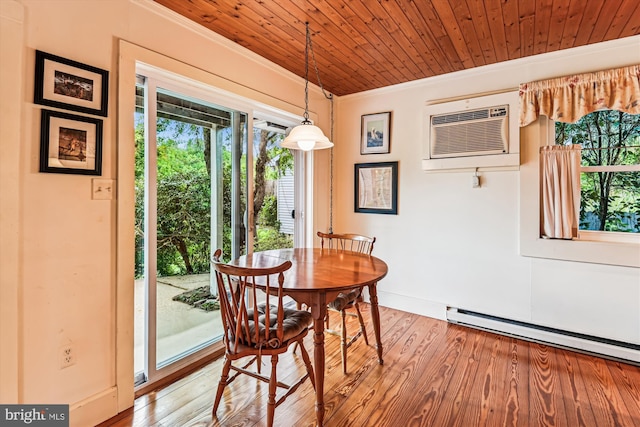 4441 Solomons Island Rd, Harwood, MD 20776 - dining room with ornamental molding, healthy amount of natural light, wood finished floors, a baseboard radiator, and wood ceiling