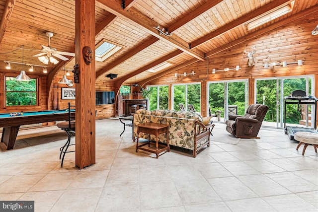 4441 Solomons Island Rd, Harwood, MD 20776 - living room featuring wood ceiling, wood walls, billiards, track lighting, and light tile patterned flooring