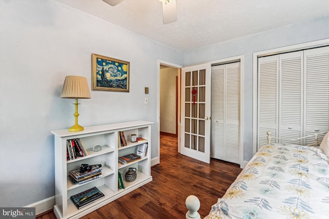 4441 Solomons Island Rd, Harwood, MD 20776 - bedroom with multiple closets, dark wood finished floors, and a ceiling fan