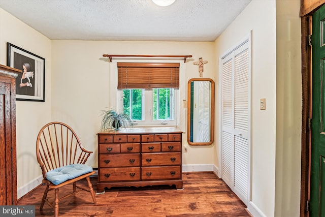 4441 Solomons Island Rd, Harwood, MD 20776 - sitting room with wood finished floors and a textured ceiling