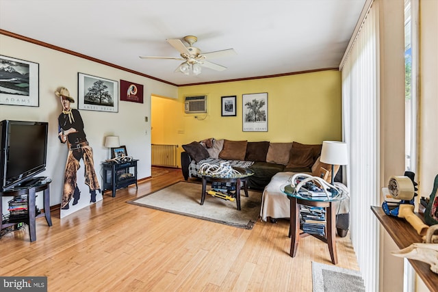 4441 Solomons Island Rd, Harwood, MD 20776 - living room featuring radiator heating unit, light wood-style flooring, ceiling fan, crown molding, and a wall mounted AC