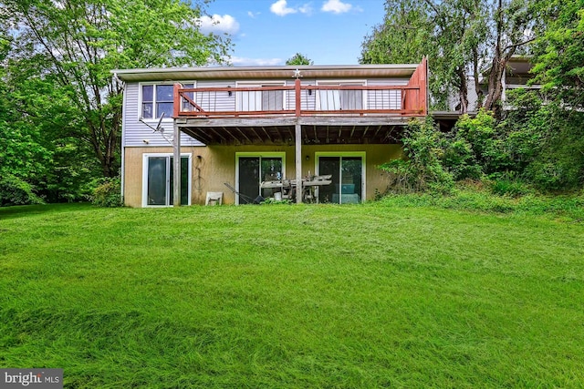 4441 Solomons Island Rd, Harwood, MD 20776 - back of property featuring a wooden deck and a lawn