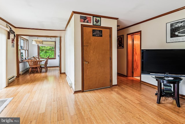 4441 Solomons Island Rd, Harwood, MD 20776 - hallway featuring crown molding, a baseboard radiator, and light wood-style floors