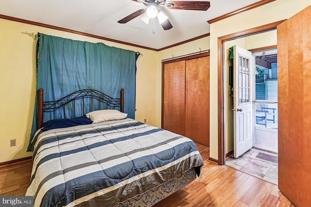 4441 Solomons Island Rd, Harwood, MD 20776 - bedroom with light wood-style floors, crown molding, a closet, and ceiling fan