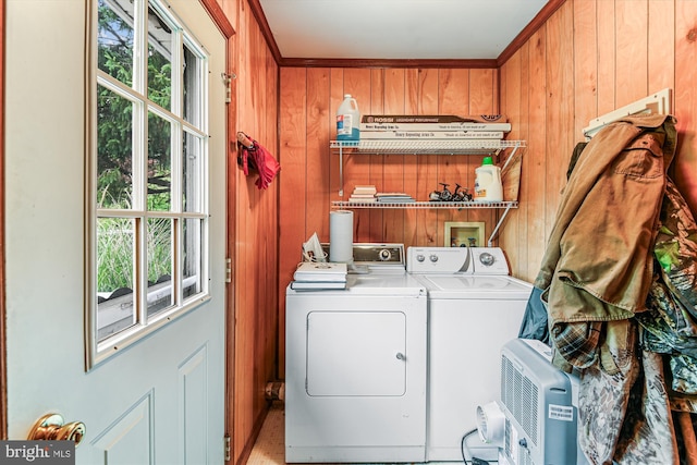 4441 Solomons Island Rd, Harwood, MD 20776 - laundry room with independent washer and dryer, healthy amount of natural light, and wood walls