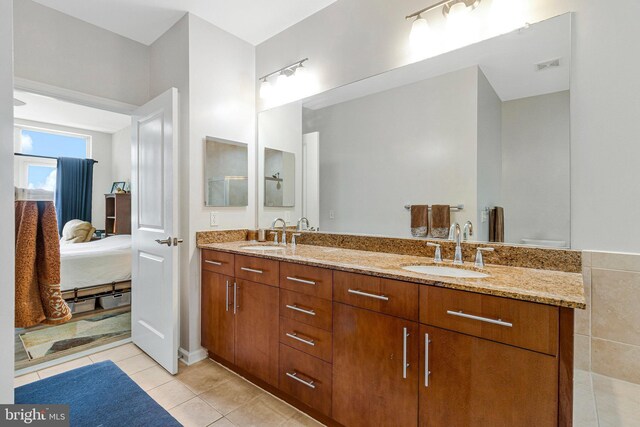 444 W Broad St Unit 401, Falls Church, VA 22046 - ensuite bathroom with double vanity and tile patterned flooring