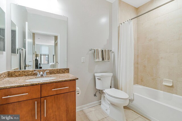 444 W Broad St Unit 401, Falls Church, VA 22046 - bathroom featuring tile patterned floors, vanity, and shower / tub combo