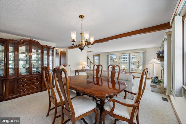 18 Old Whaling Ln, Long Beach Township, NJ 08008 - carpeted dining room with a chandelier and beam ceiling
