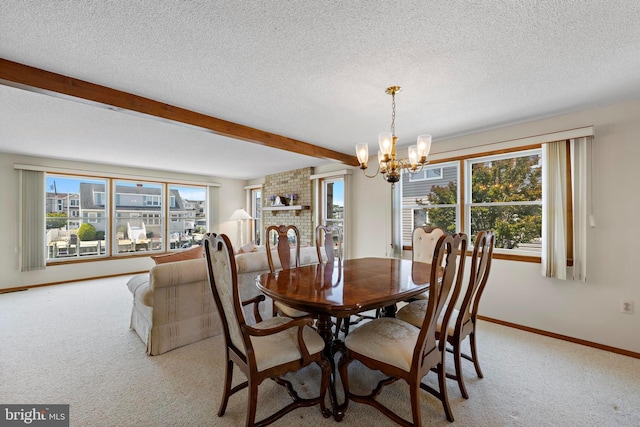 18 Old Whaling Ln, Long Beach Township, NJ 08008 - dining space featuring a chandelier, light colored carpet, beam ceiling, and a textured ceiling