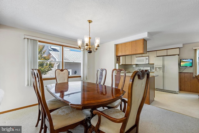 18 Old Whaling Ln, Long Beach Township, NJ 08008 - dining room with a chandelier, light carpet, and a textured ceiling