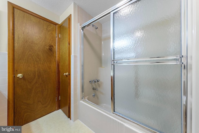 18 Old Whaling Ln, Long Beach Township, NJ 08008 - bathroom featuring enclosed tub / shower combo and a textured ceiling