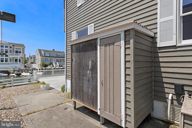18 Old Whaling Ln, Long Beach Township, NJ 08008 - view of outbuilding with a residential view and a water view