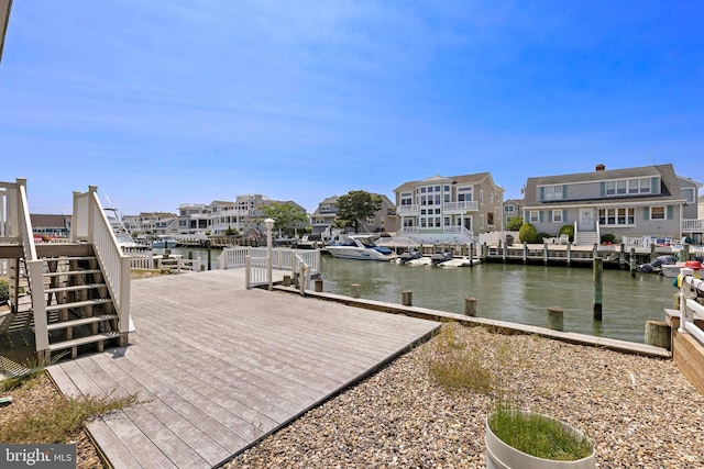 18 Old Whaling Ln, Long Beach Township, NJ 08008 - dock featuring a residential view, stairs, and a deck with water view