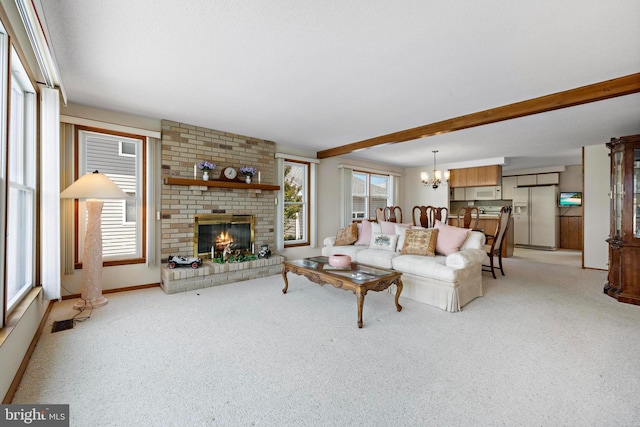18 Old Whaling Ln, Long Beach Township, NJ 08008 - living area with light colored carpet, a chandelier, a brick fireplace, and beamed ceiling