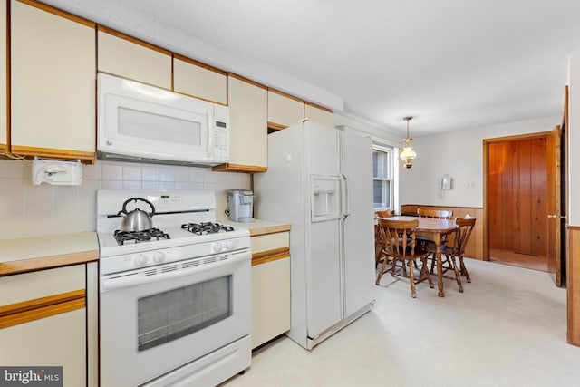 18 Old Whaling Ln, Long Beach Township, NJ 08008 - kitchen with white appliances, light countertops, and decorative backsplash