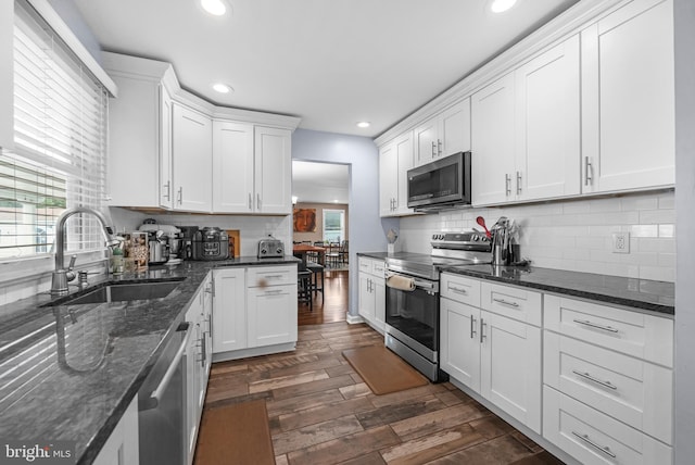 17 Concord Rd, Marlton, NJ 08053 - kitchen featuring stainless steel appliances, a sink, recessed lighting, white cabinets, and dark wood-type flooring